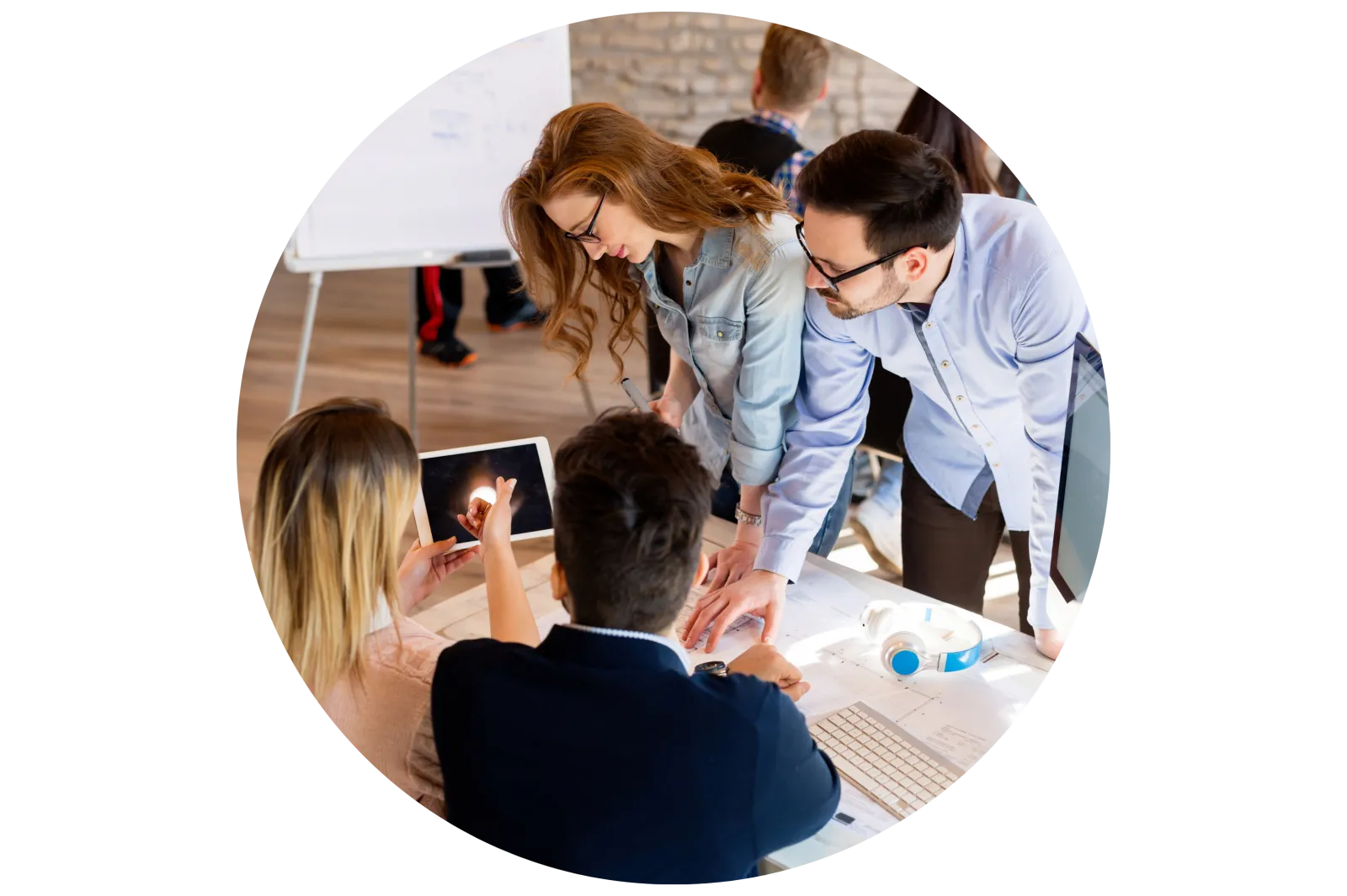 group of professionals planning around a table