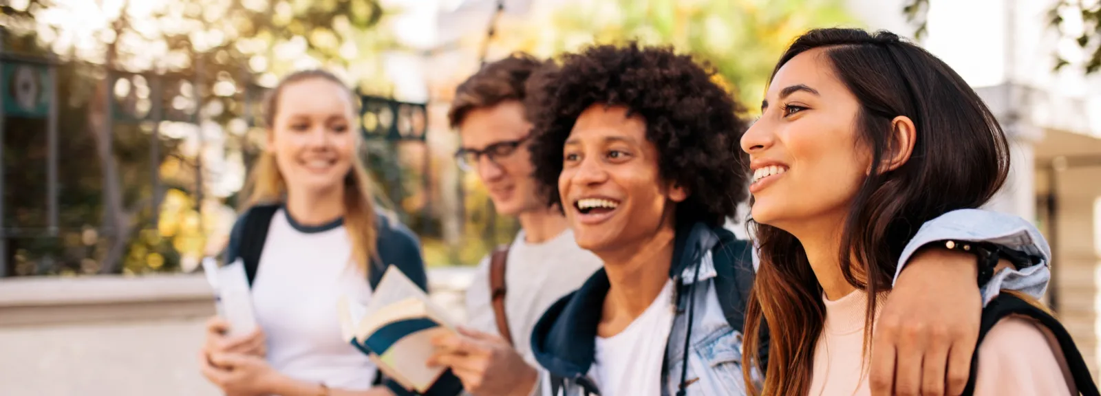 Students walking together smiling and laughing