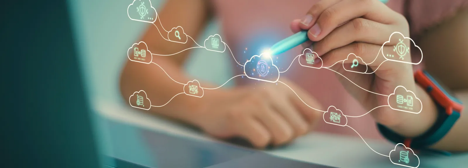 photo of female sitting at a desk with a digital creation of web cloud sharing