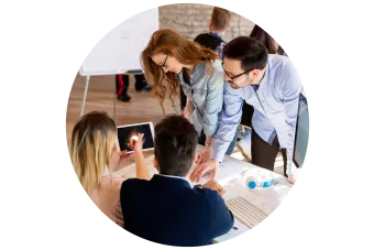 group of professionals planning around a table