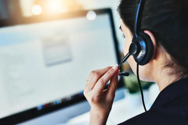 Person with a headset providing support